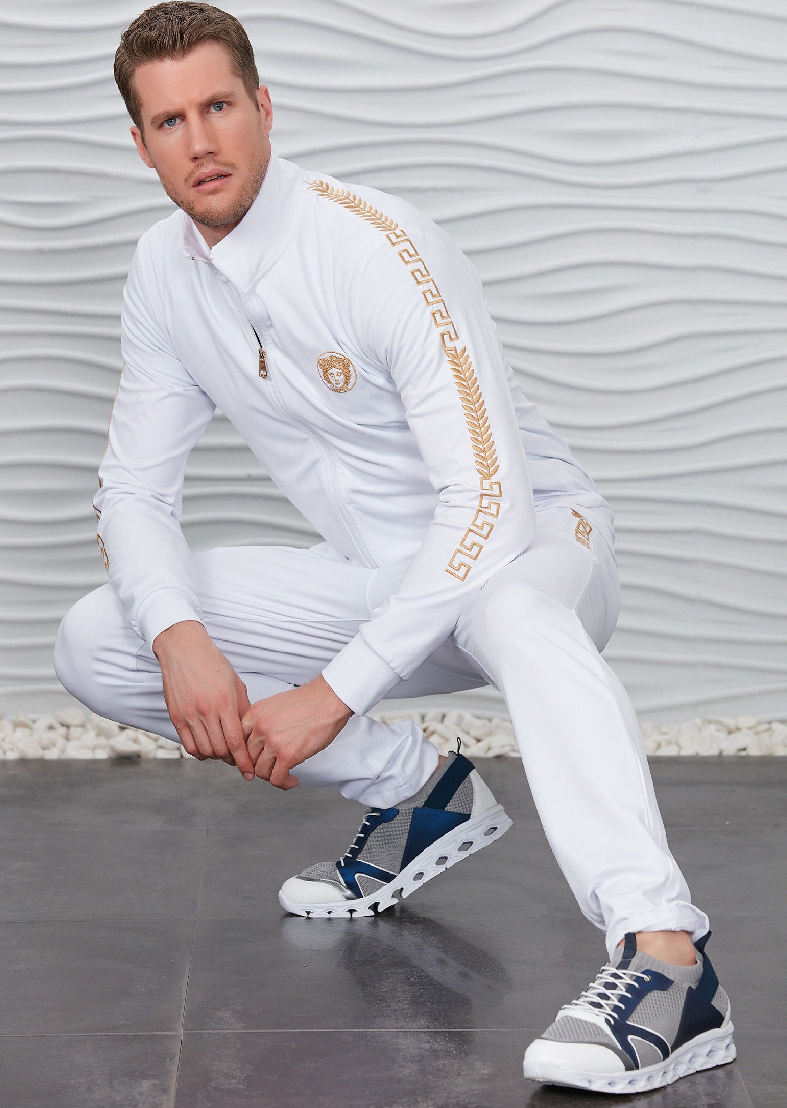 White and gold jogging suit 2025
